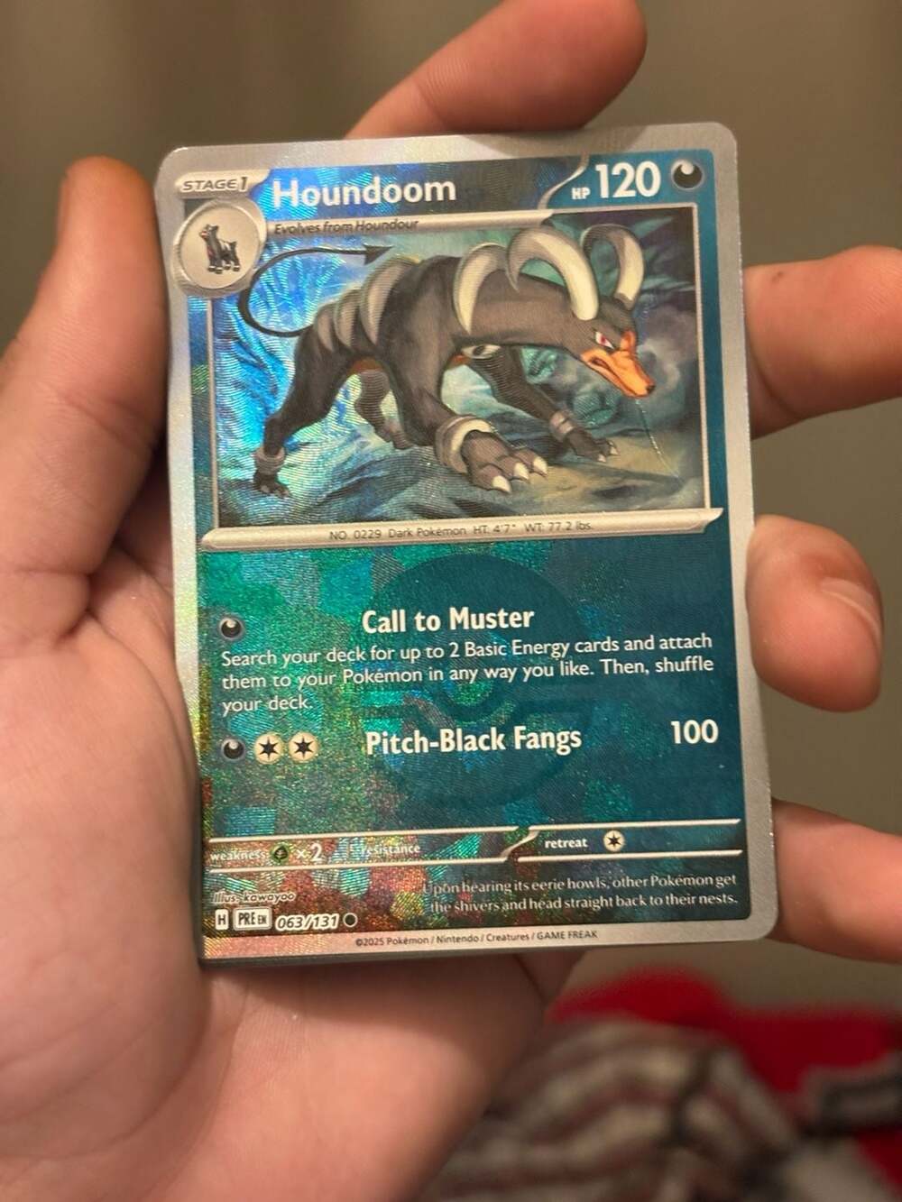 Houndoom 063/131 - Pokeball Reverse Holo - Pokémon TCG Prismatic Evolutions